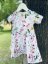 Dievčenské úpletové šaty s nazberkanou sukňou - letné kvety