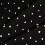 Zlaté srdiečka na čiernej